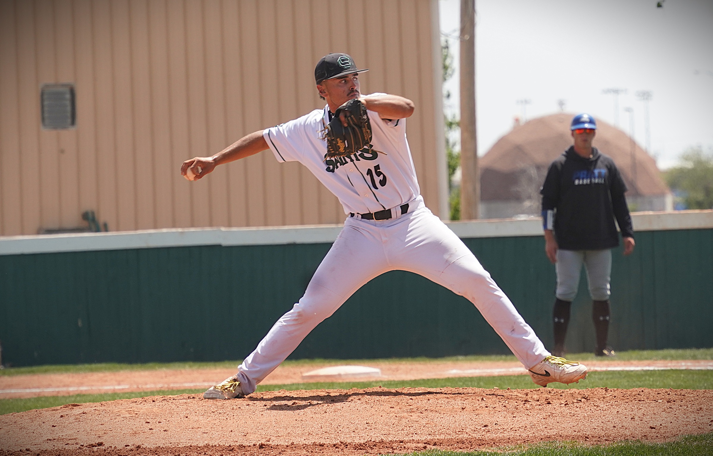 Saints split at Dodge City, lose 10-0, win 10-8