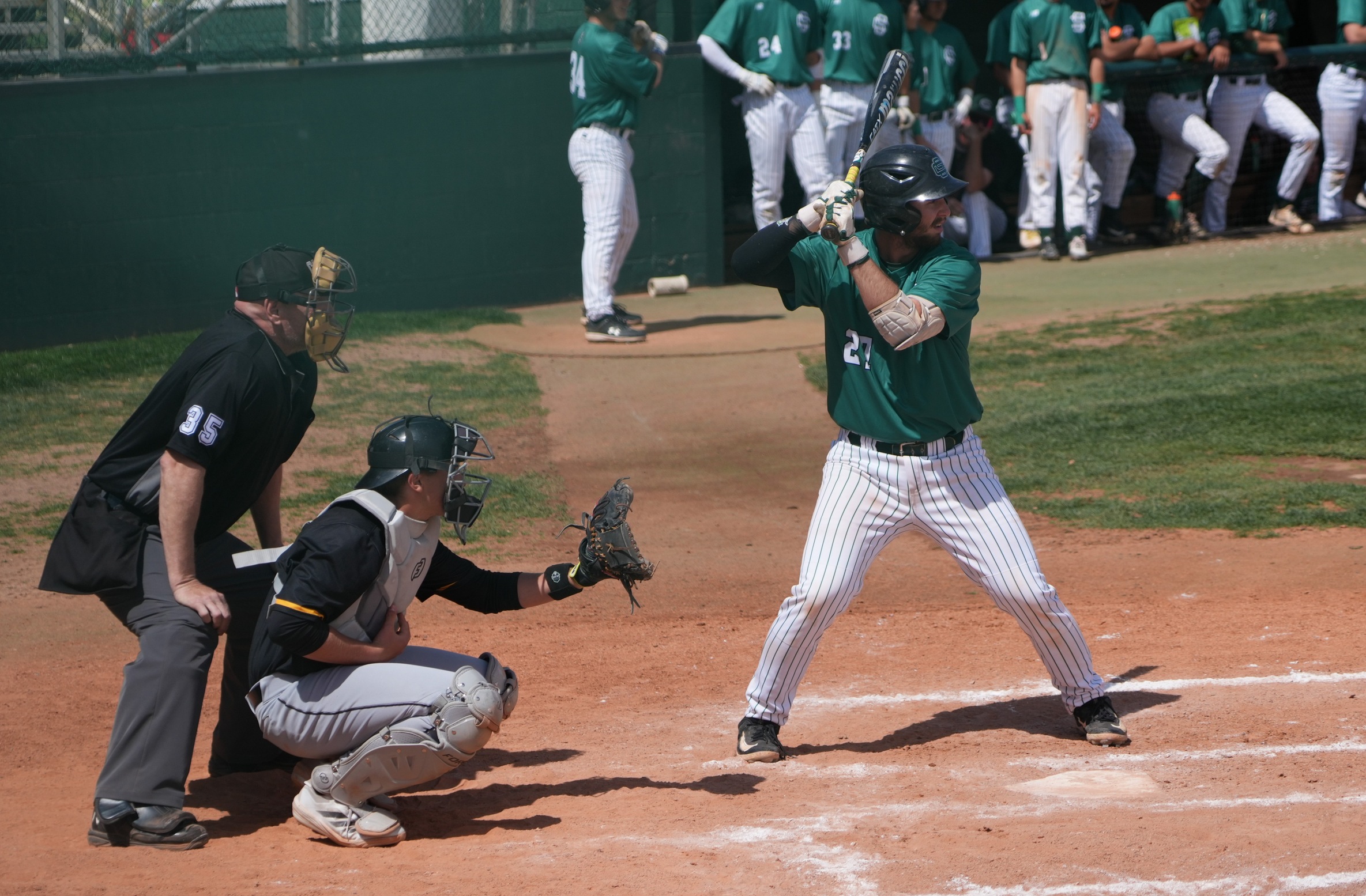 Saints sweep Colby in slugfest, 14-10 and 19-16