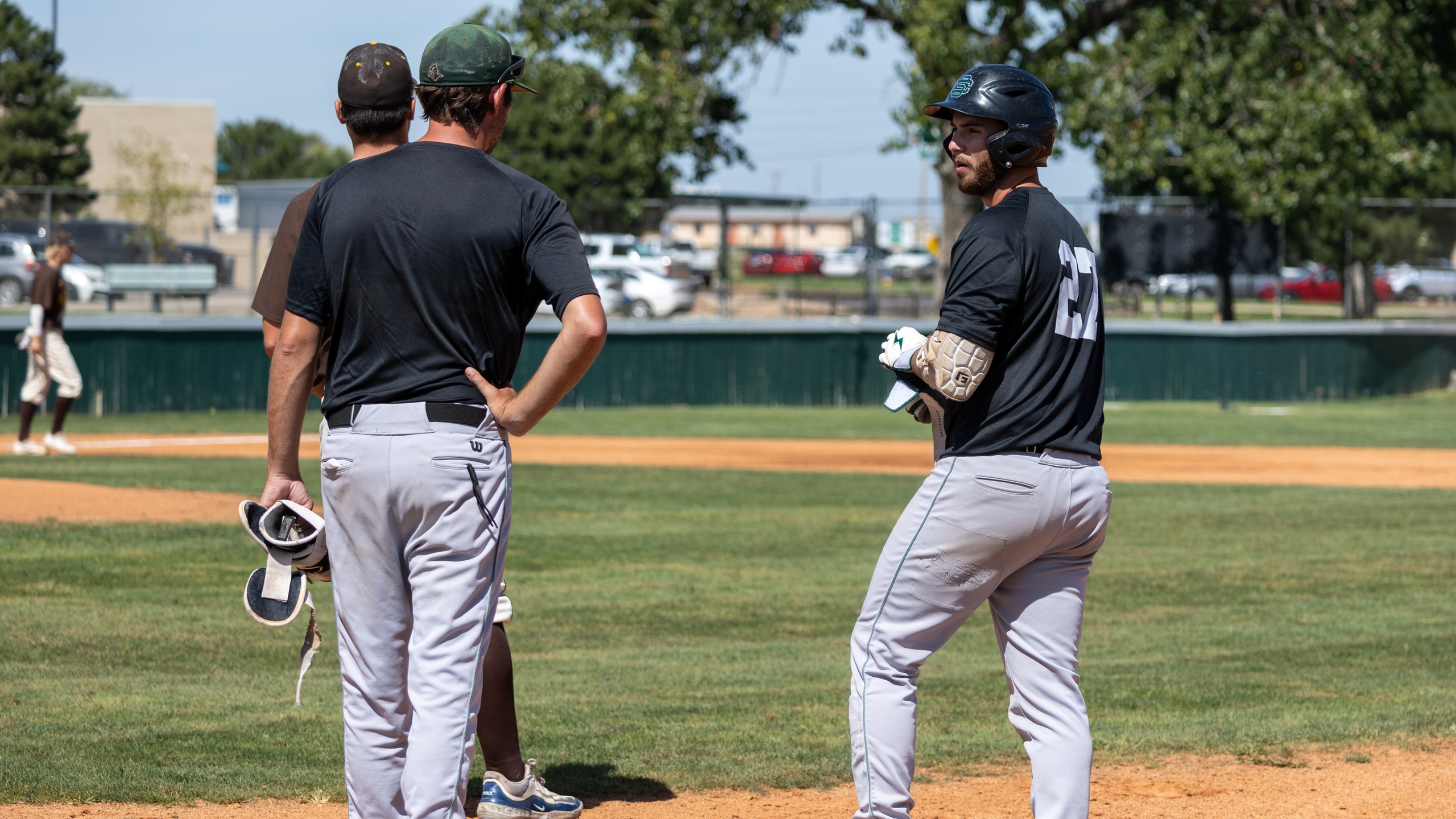 Sophomore Ryan Todd looks to assistant coach Austin King during a fall ball scrimmage vs. Garden City. Todd and the Saints open the 2026 season on Saturday at Lamar CC.