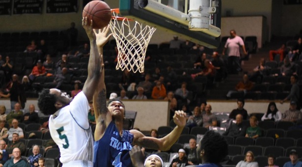 Morcency, Flowers lead Saints to fifth straight win with victory over Trojans