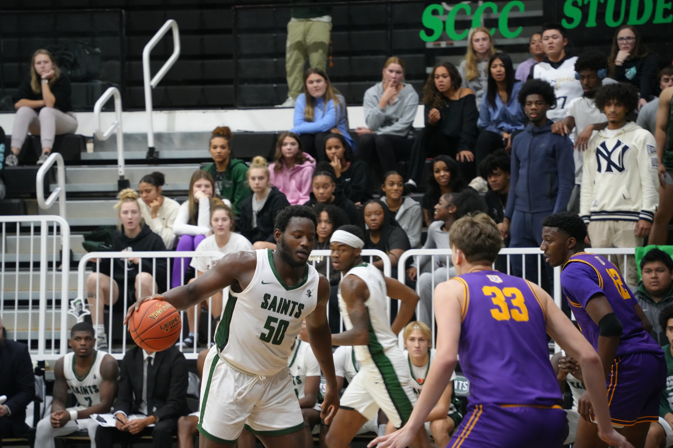 Saints cruise past Runnin' Lopes, 86-77, to earn first win of season