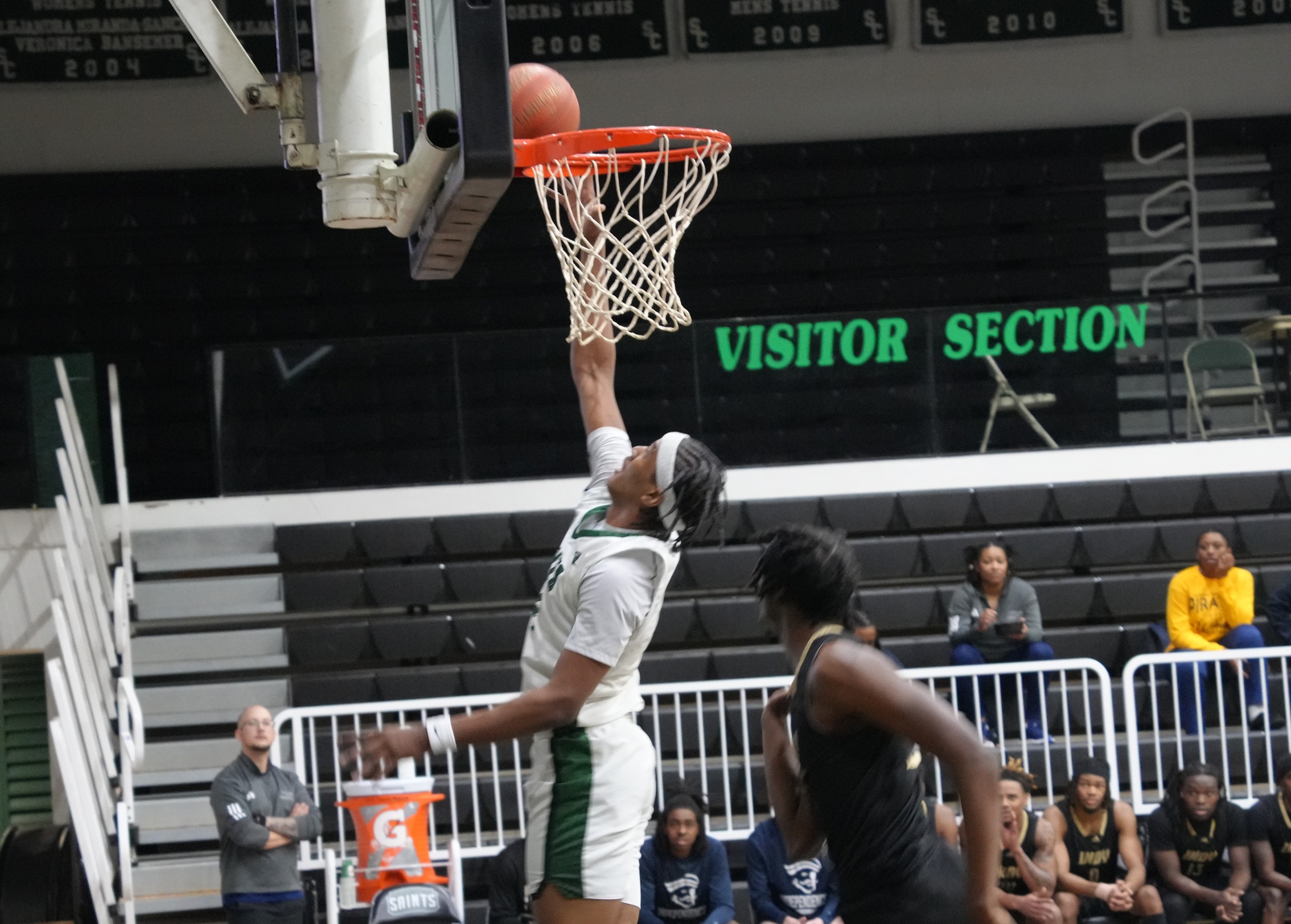 Saints lose close contest to Pirates, 70-63
