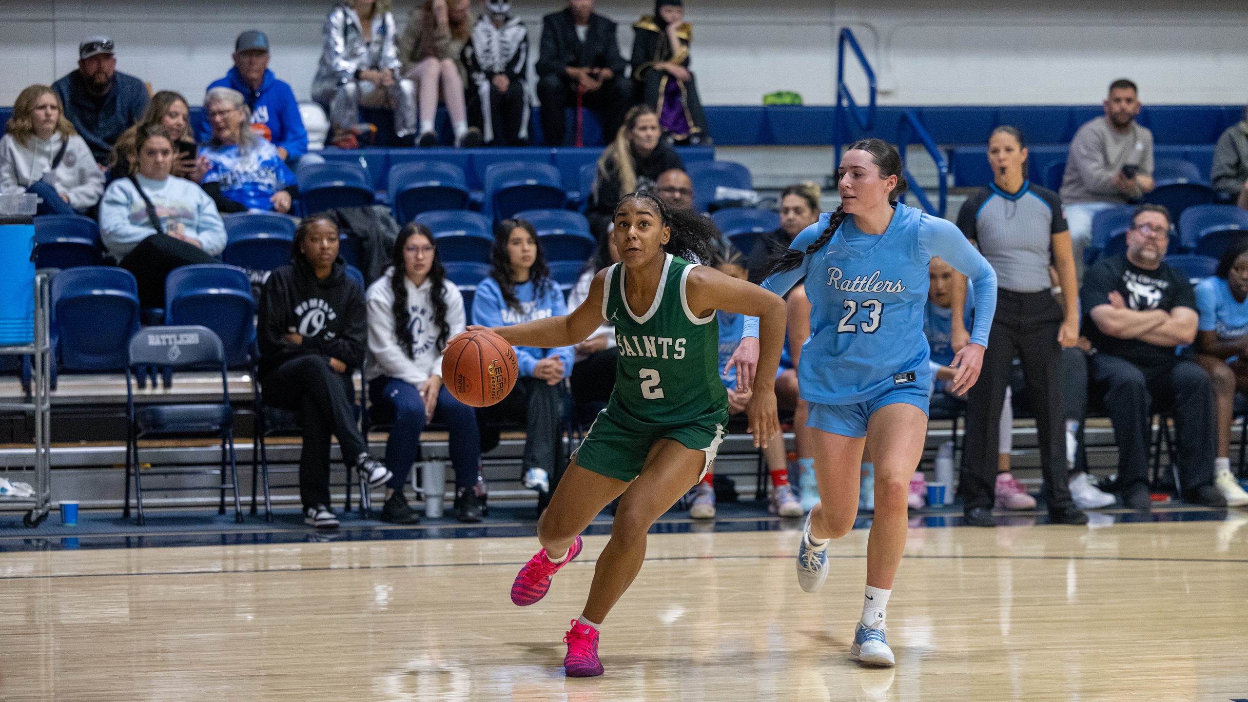 Redshirt freshman Kimora Fagan (pictured left) finished with 21 points, 10 rebounds, four assists and two steals in her Lady Saints debut.