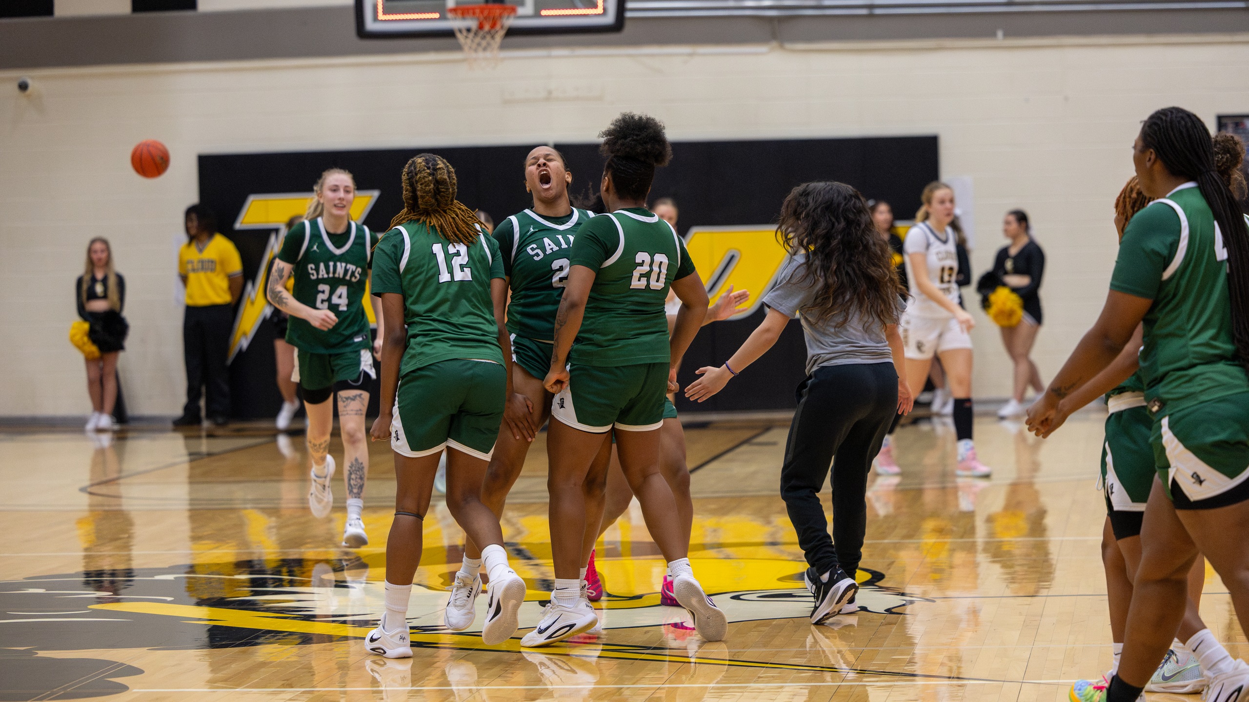 RaMya Kennedy Yells in Celebration With Teammates Following the Lady Saints Win